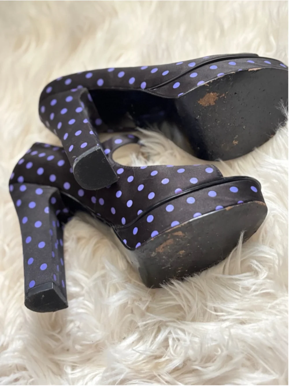 Well worn woman's platform heels 7